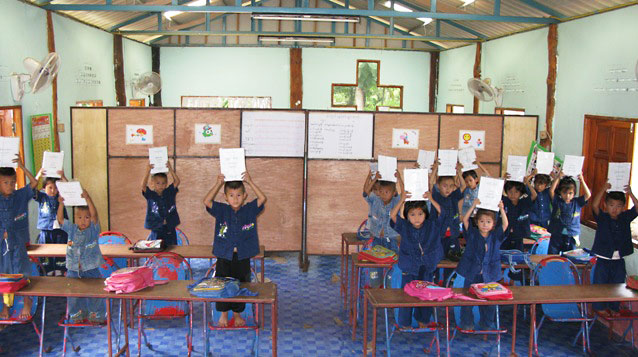 school children with books